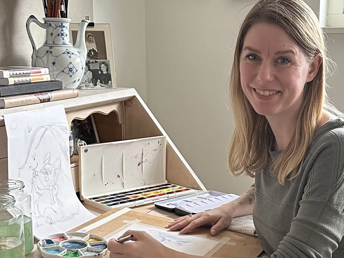 Tine Hansen at her desk
